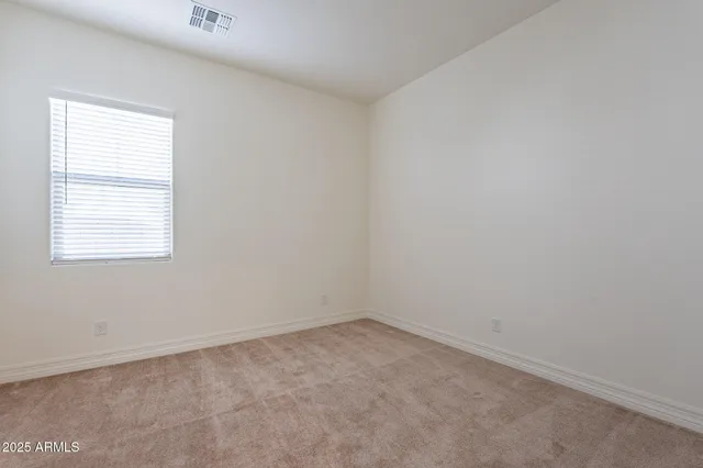 a bathroom with a sink toilet and vanity