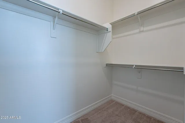 a view of a porch next to a yard