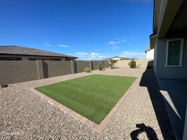 a view of a yard and entertaining space