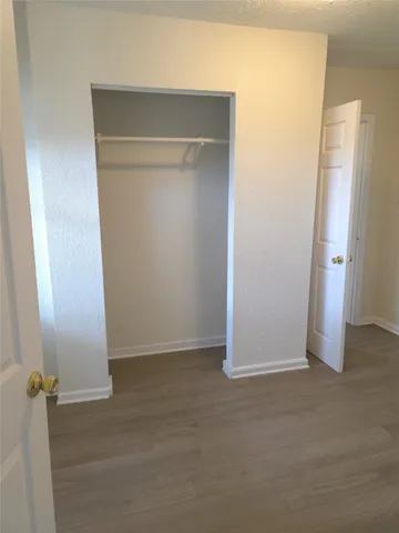 an empty room with closet