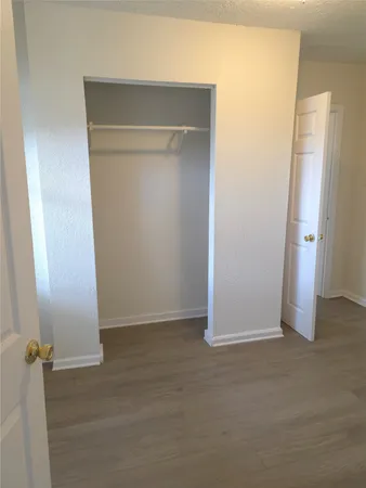 an empty room with closet