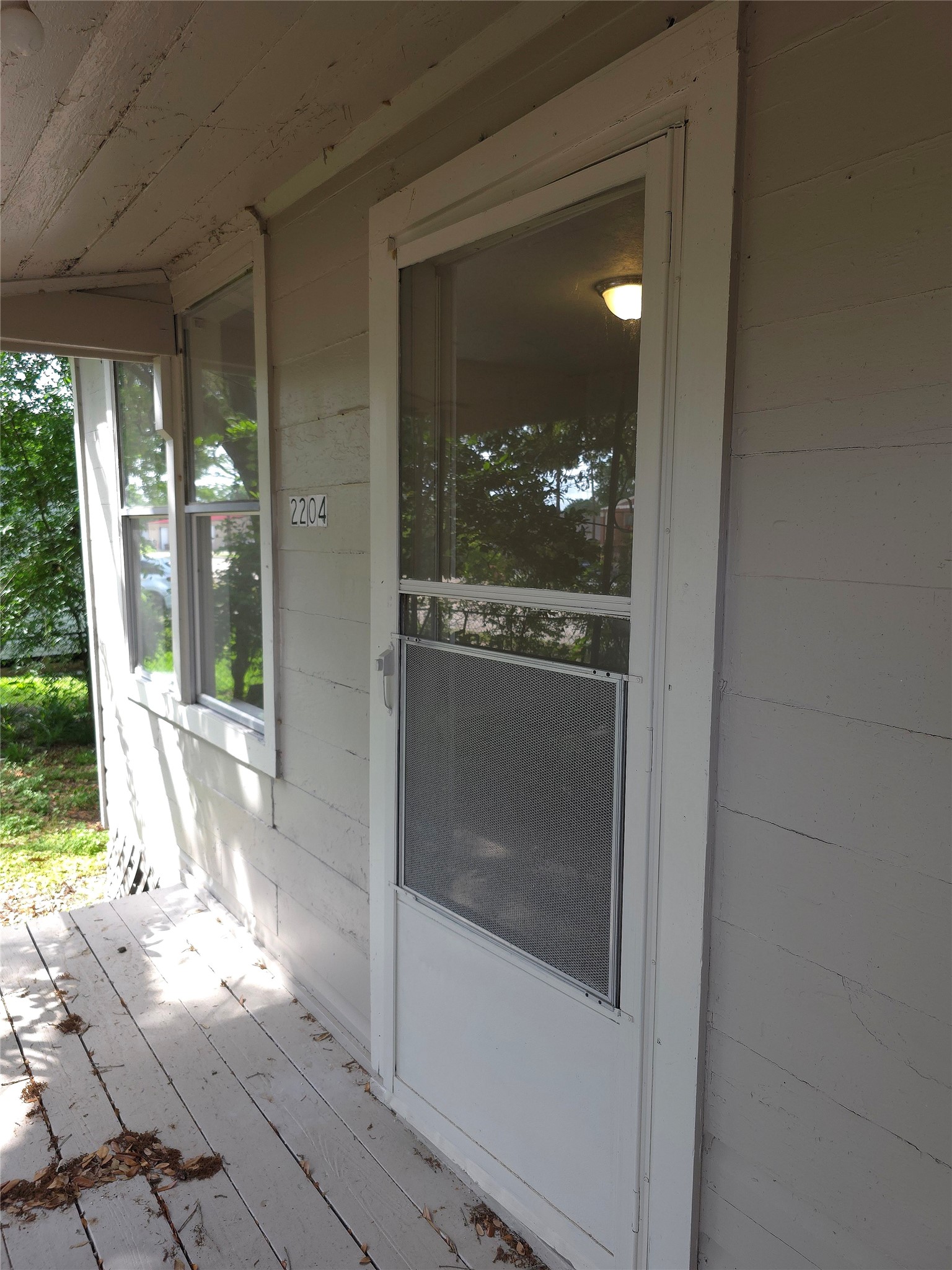 2204 Highway 3 Dickinson, TX 77539 - Photo 4 of 29 a view of a glass door of the house