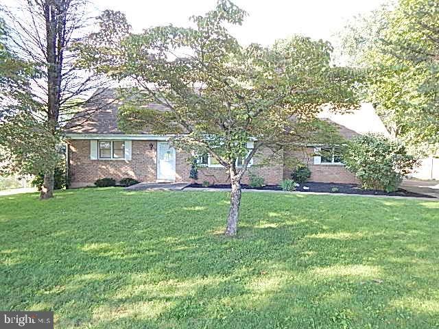 2310 Mountain Road Manheim, PA 17545 - Photo 1 of 17 a front view of house with yard and green space