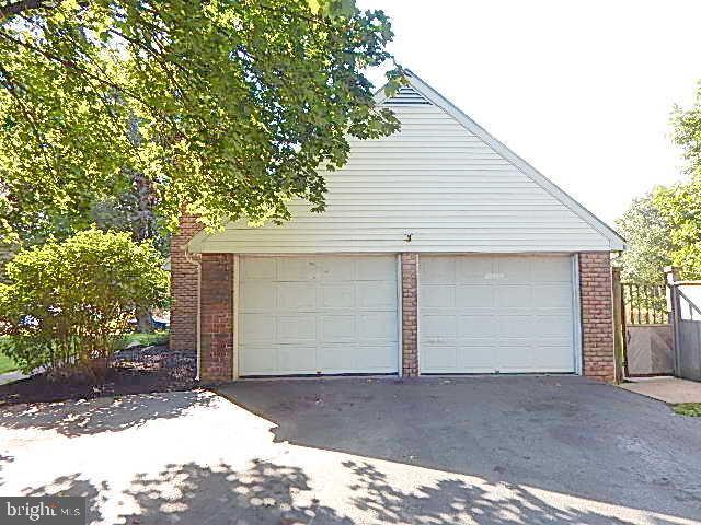 2310 Mountain Road Manheim, PA 17545 - Photo 15 of 17 a front view of a house with a yard and garage