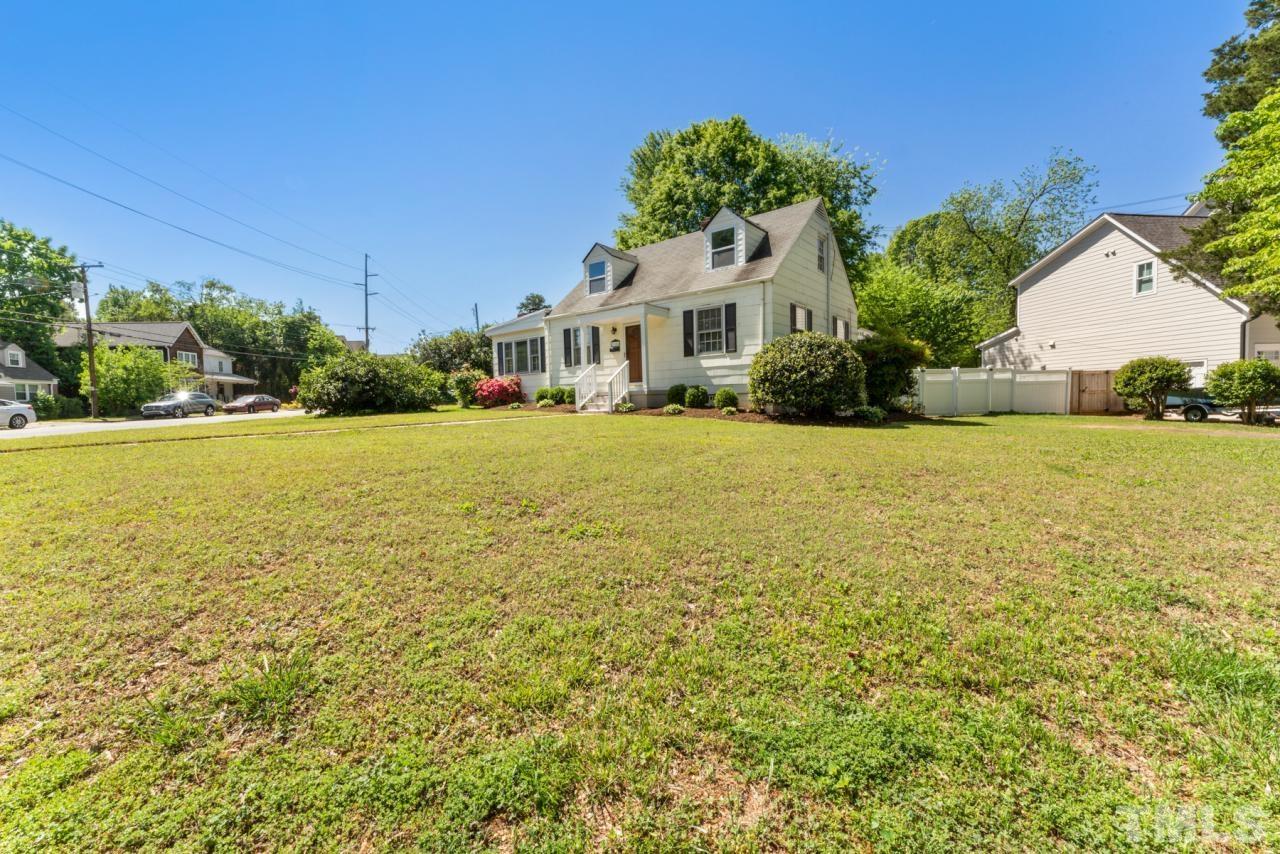 1955 Bernard Street Raleigh, NC 27608 - Photo 28 of 42 a front view of a house with a yard