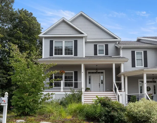 front view of a house with a small yard