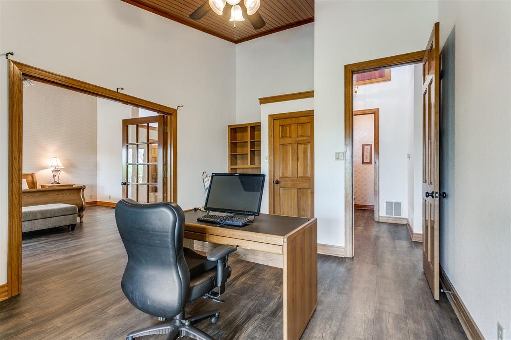 1557 Latigo Hills Road Bartonville, TX 75022 - Photo 14 of 40 Office with ceiling fan, a high wooden ceiling, and dark wood finished floors