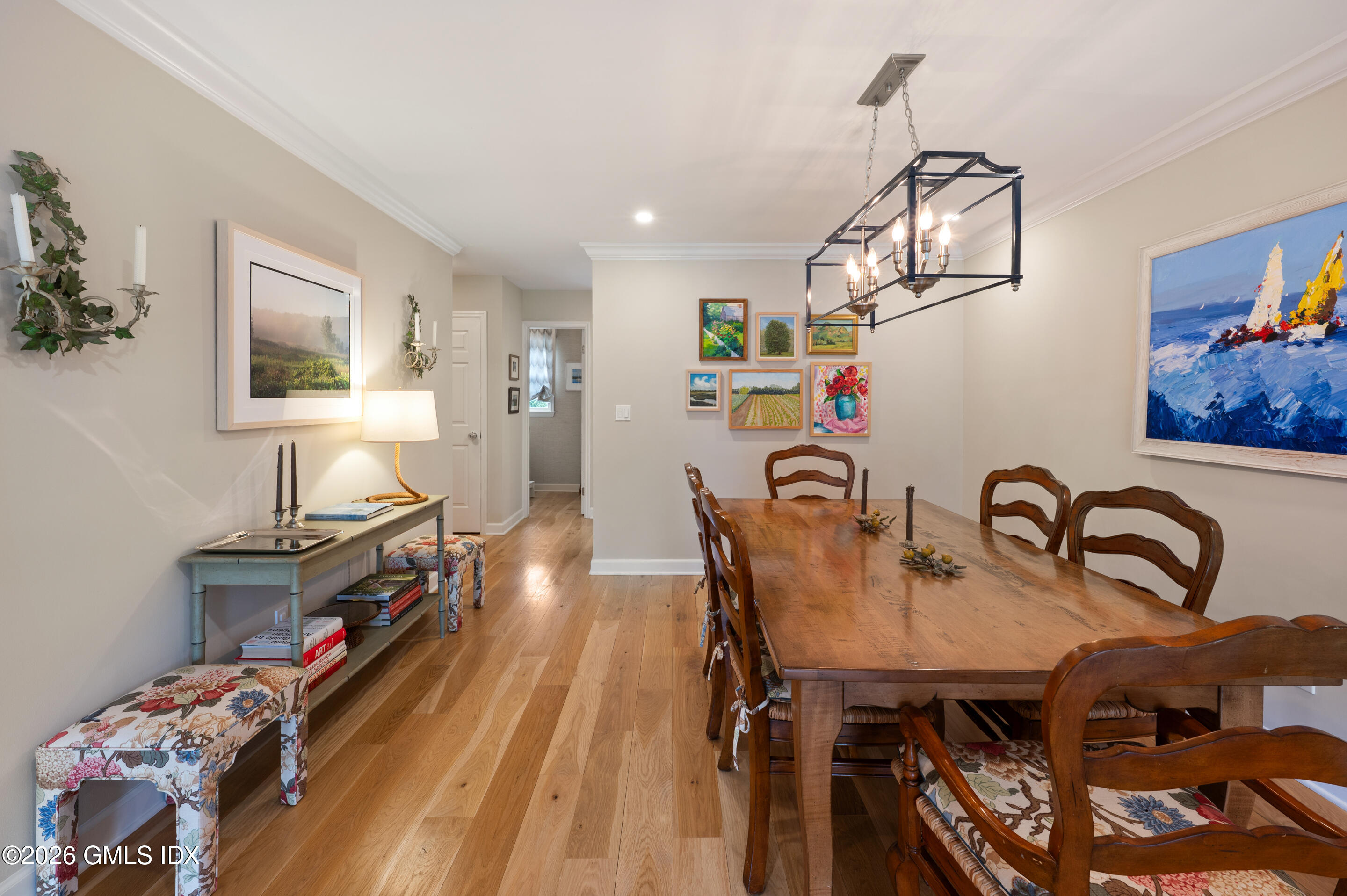 115 River Road, Unit 3 Cos Cob, CT 06807 - Photo 24 of 40 a dining room with furniture and wooden floor