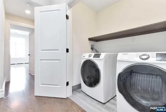 a utility room with dryer and washer
