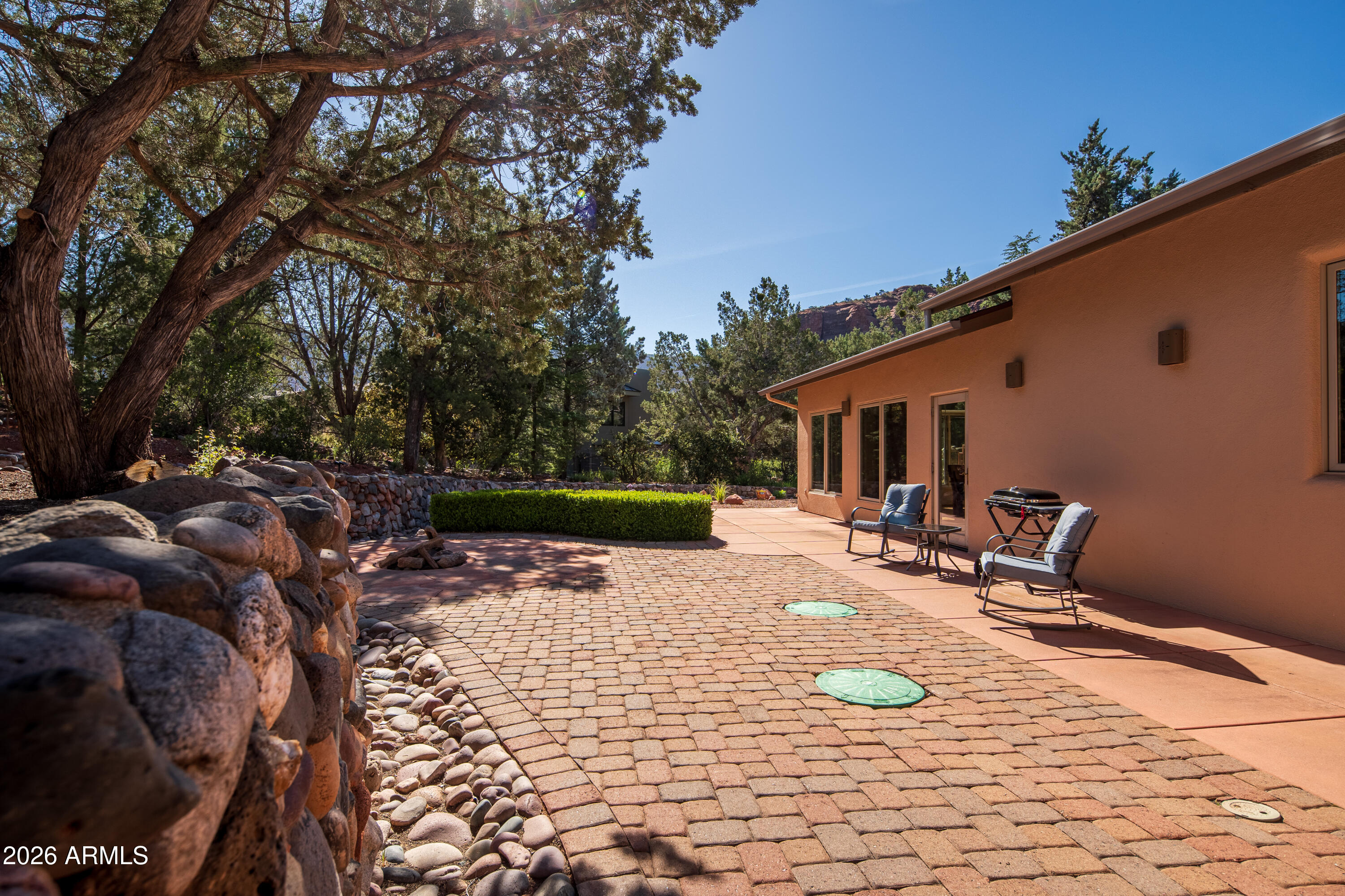 190 Morgan Road Sedona, AZ 86336 - Photo 20 of 51 a view of a backyard with sitting area