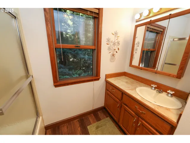 a living room with fireplace furniture and a flat screen tv