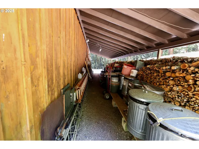 a outdoor dining space with furniture and wooden floor