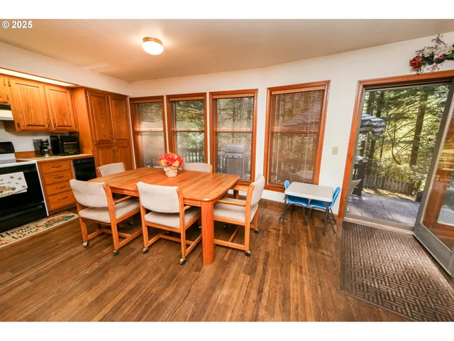 a view of a chairs and tables in the roof deck
