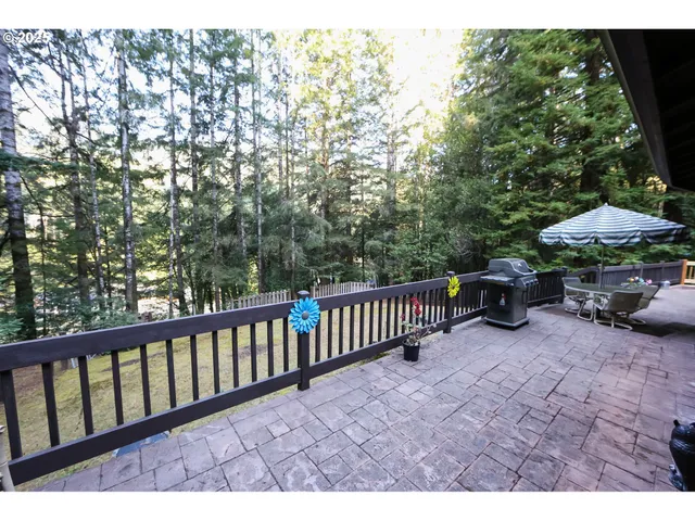 a view of balcony and yard