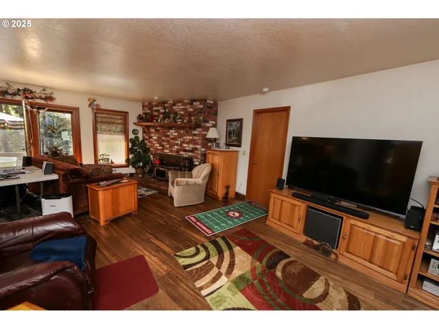 a bedroom with a bed and a desk