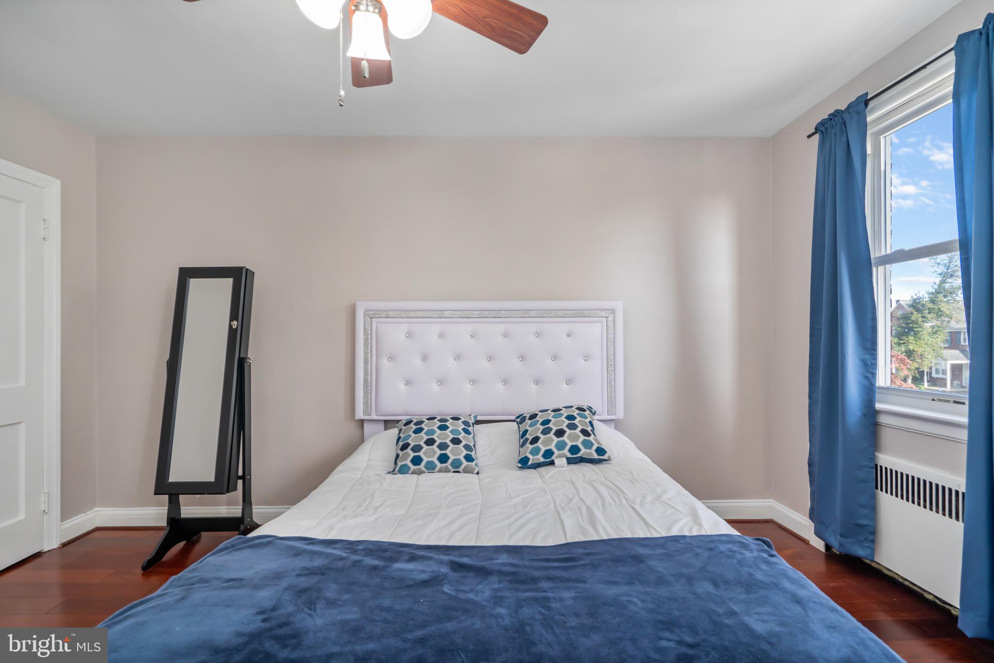 3704 Monterey Road Baltimore, MD 21218 - Photo 13 of 32 a room with a bed and a window