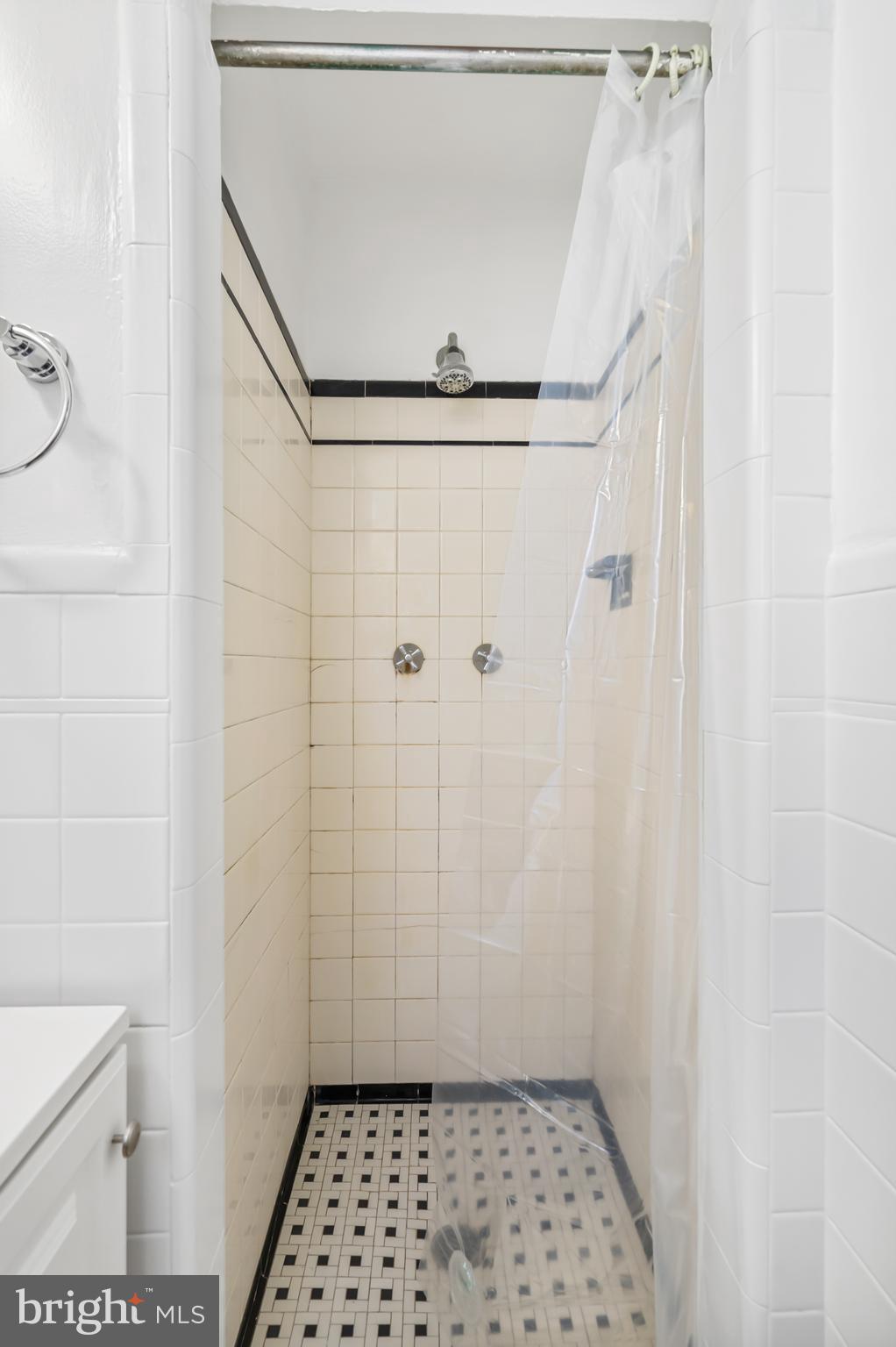 3704 Monterey Road Baltimore, MD 21218 - Photo 17 of 32 a bathroom with a shower