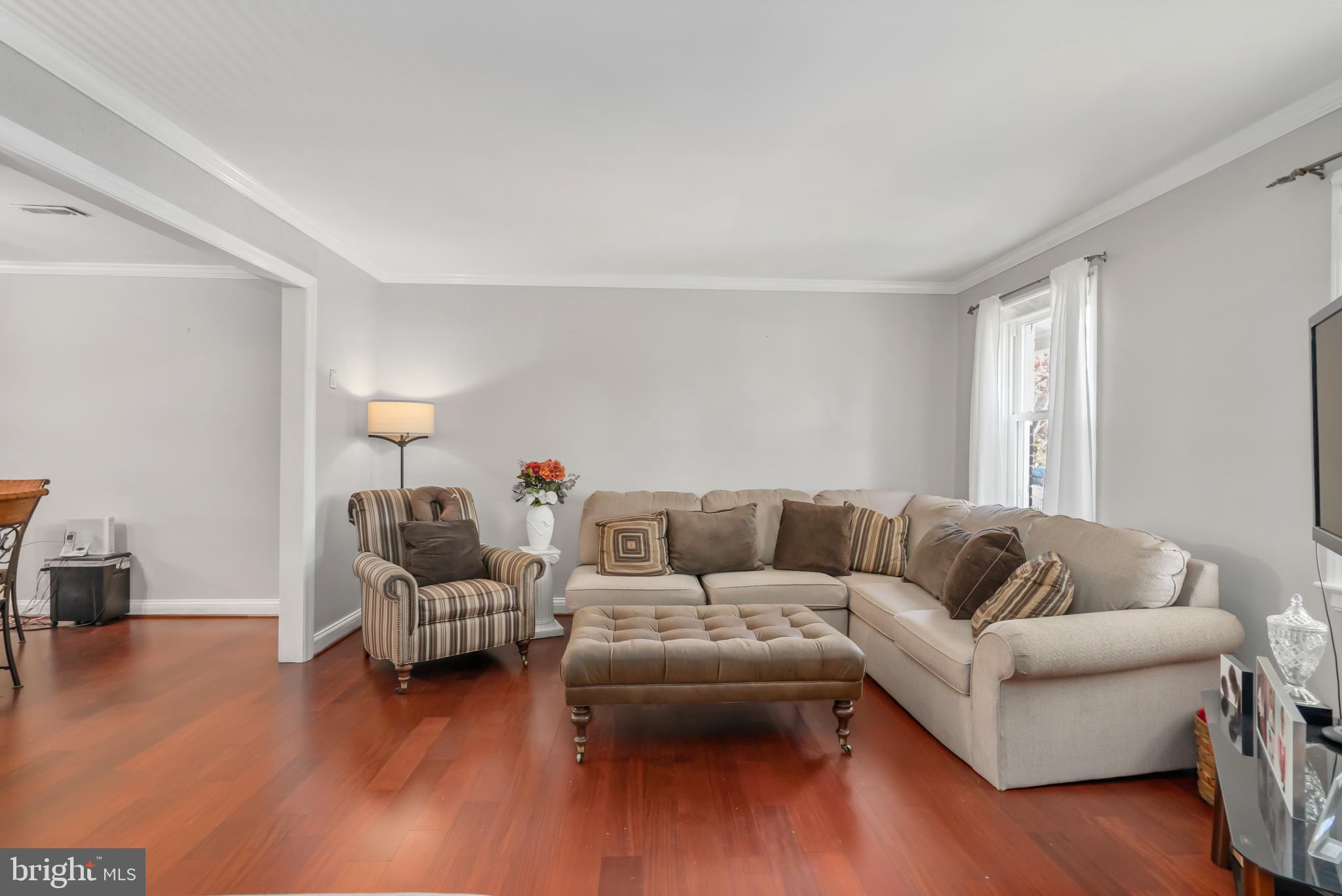 3704 Monterey Road Baltimore, MD 21218 - Photo 5 of 32 a living room with furniture and a couch