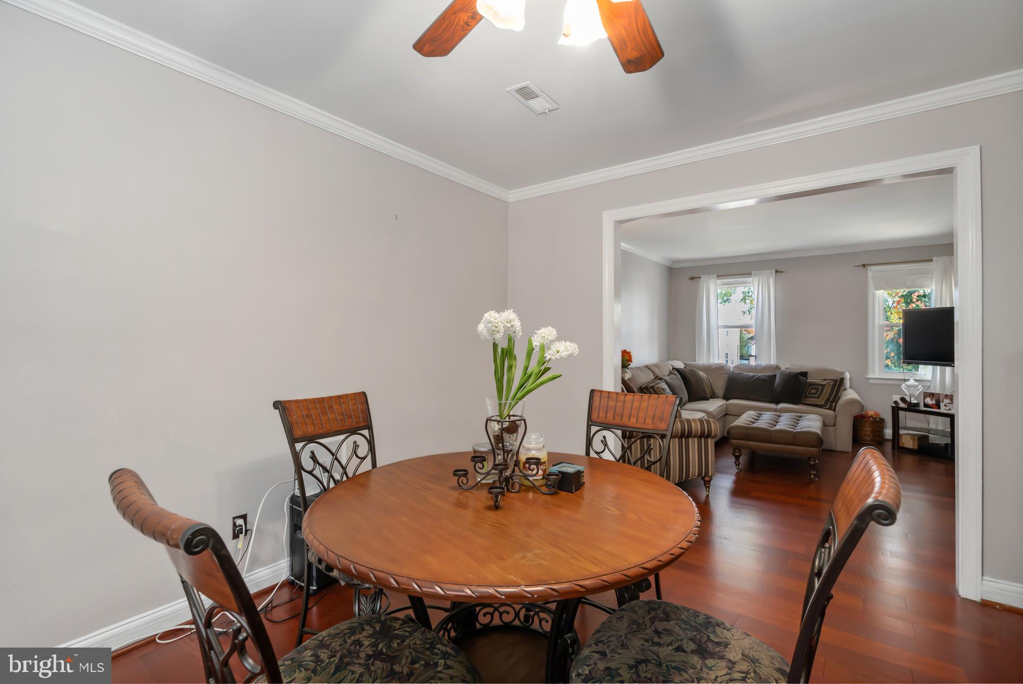 3704 Monterey Road Baltimore, MD 21218 - Photo 6 of 32 a living room with furniture and wooden floor