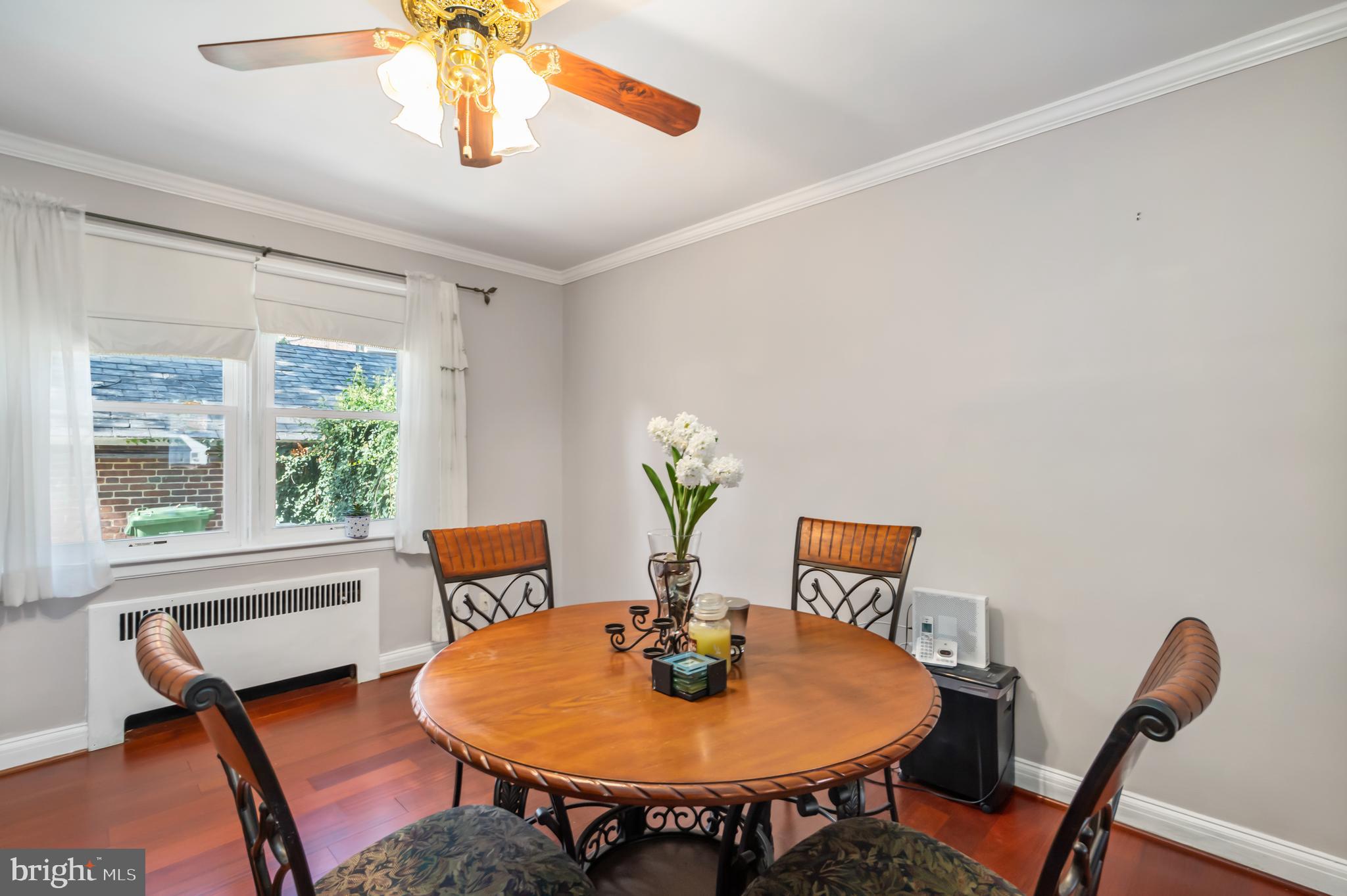 3704 Monterey Road Baltimore, MD 21218 - Photo 7 of 32 a view of a dining room with furniture and wooden floor