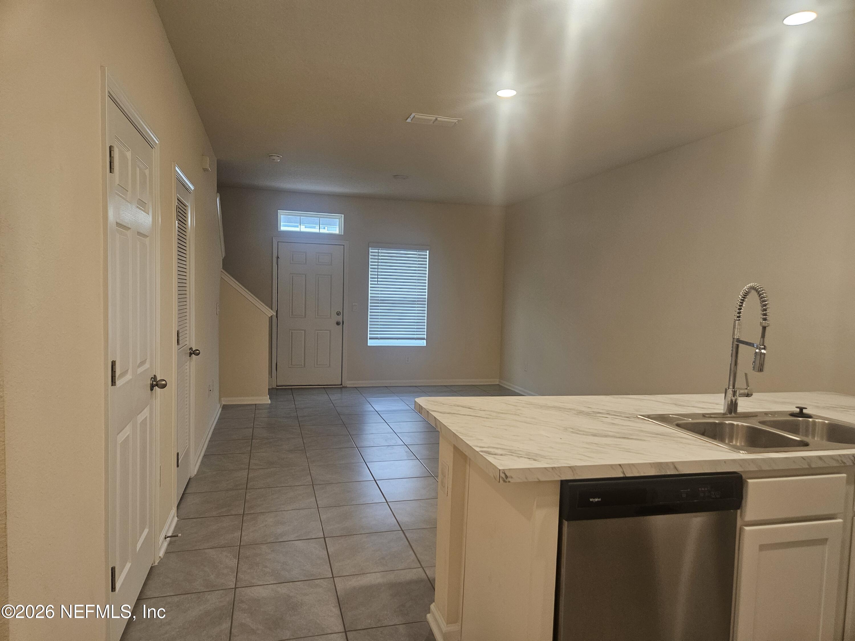 86640 Shortline Circle Yulee, FL 32097 - Photo 5 of 11 a bathroom with a sink and a mirror