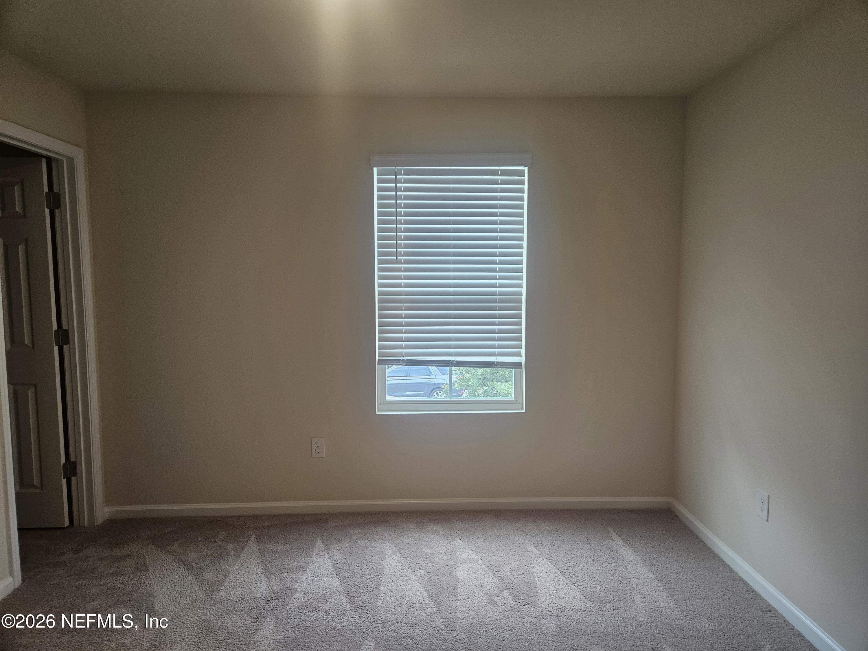 86640 Shortline Circle Yulee, FL 32097 - Photo 10 of 11 an empty room with a window