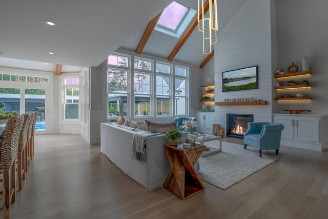 a bedroom with furniture and a wooden floor