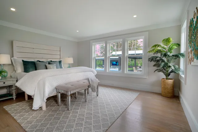 a living room with a garden and a potted plant