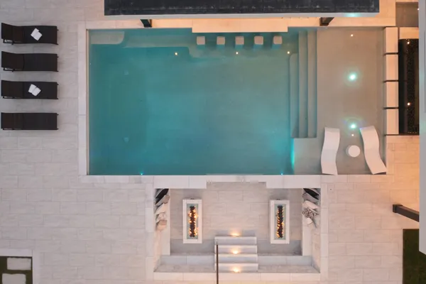 a swimming pool view with a outdoor space