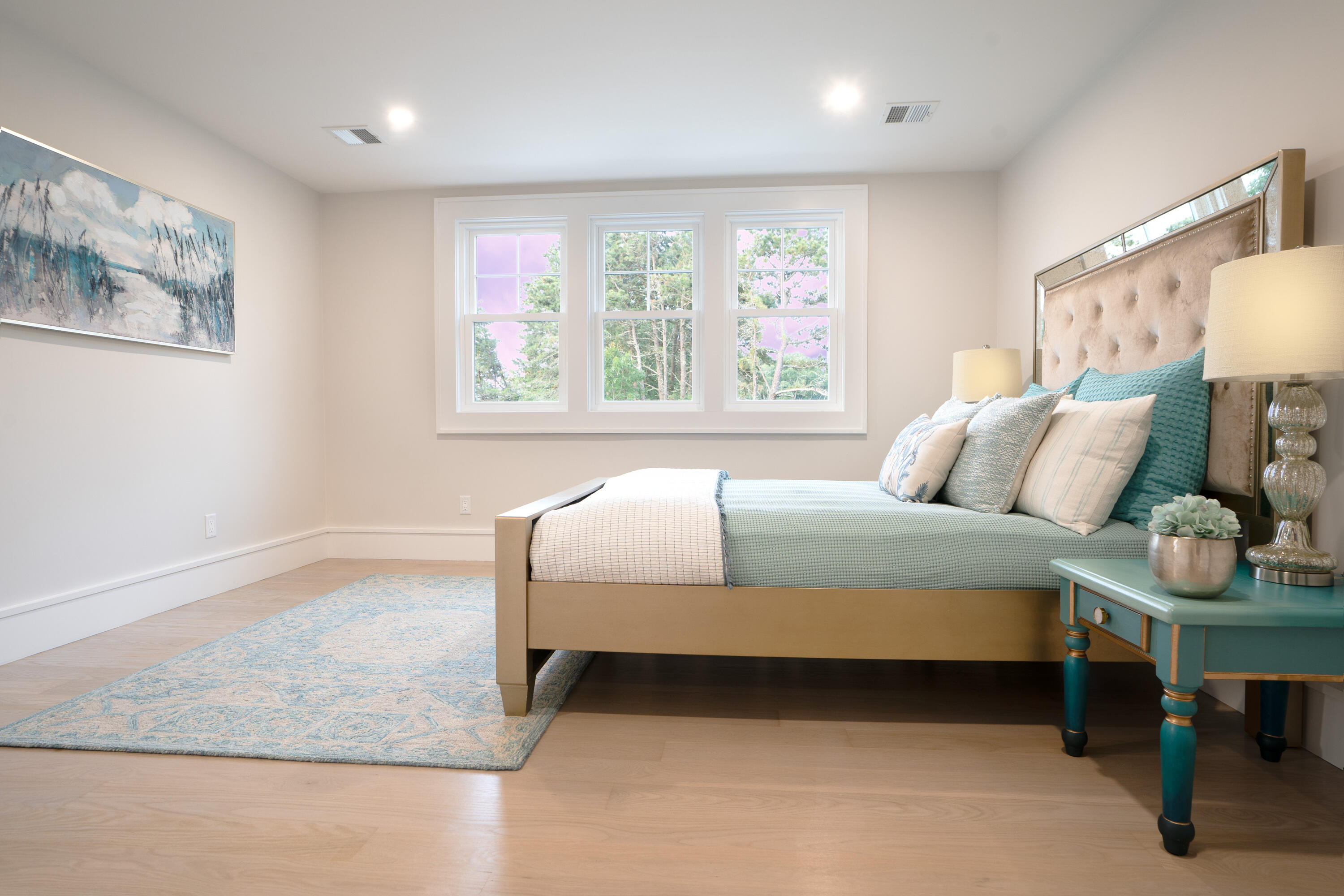 171 Searsville Road South Dennis, MA 02660 - Photo 53 of 100 a bedroom with a bed and a dresser next to a window