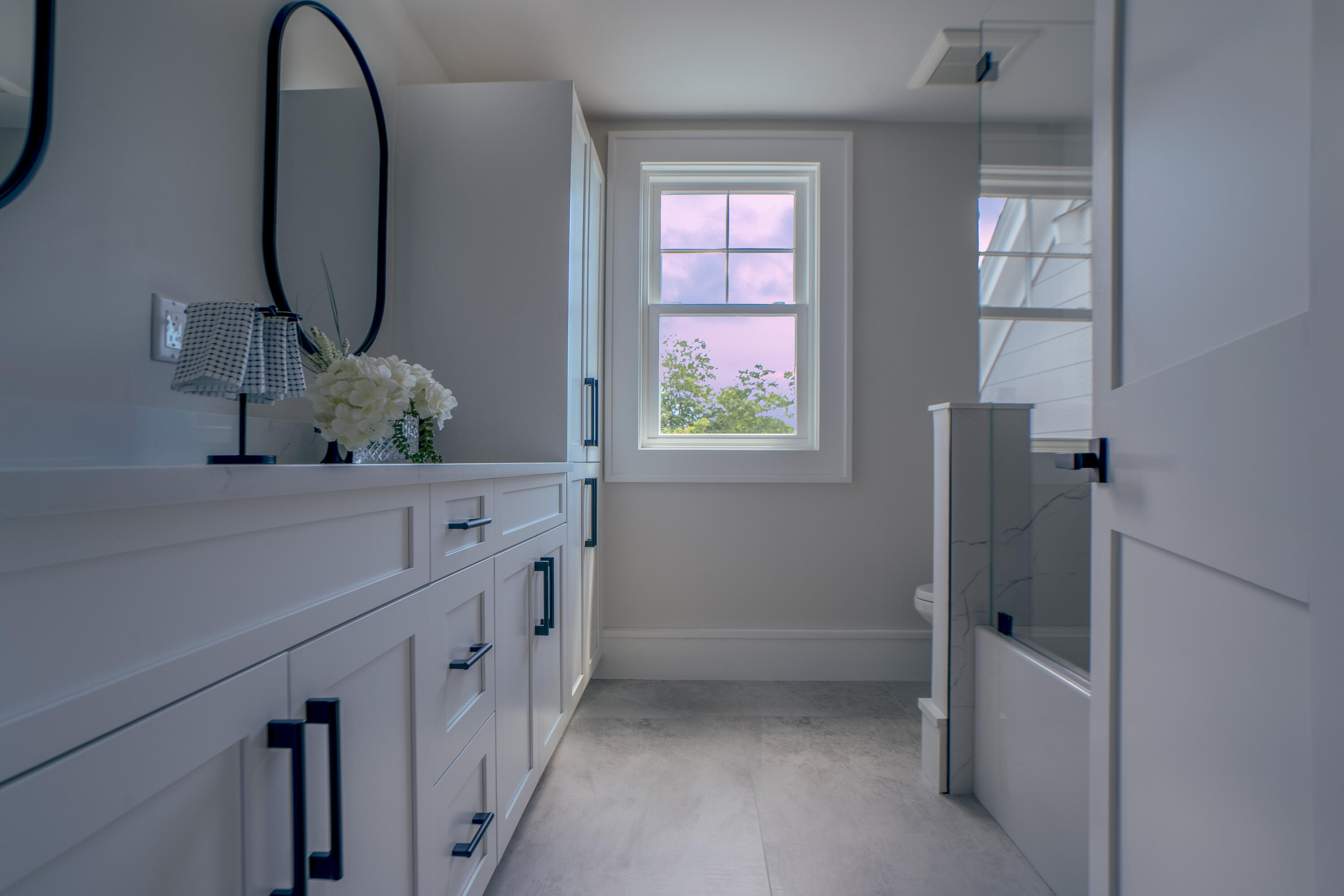 171 Searsville Road South Dennis, MA 02660 - Photo 62 of 100 a bathroom with a double vanity sink and a mirror