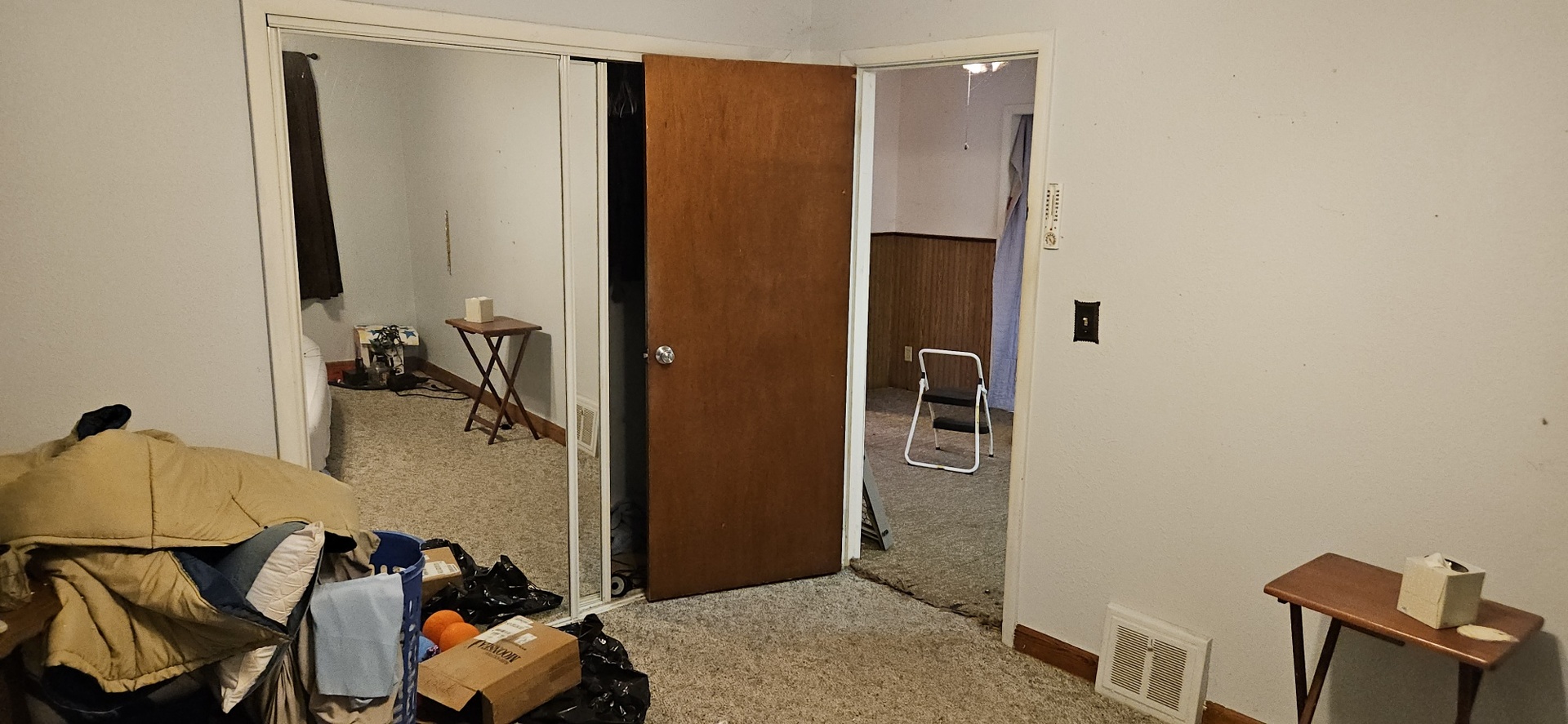 4820 8th Street Rock Island, IL 61201 - Photo 2 of 17 a bedroom with a bed and furniture