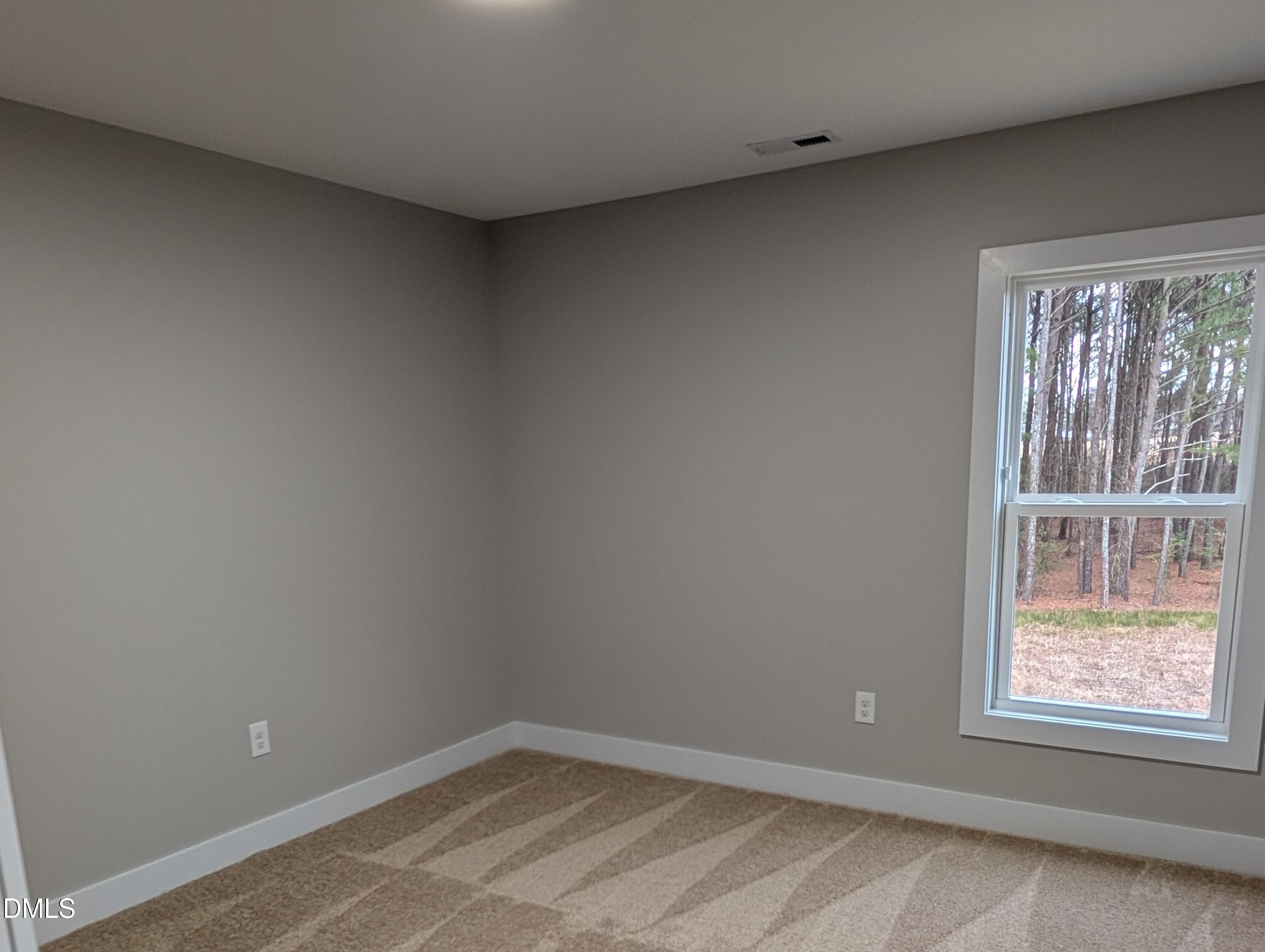 749 West Church Street Angier, NC 27501 - Photo 18 of 37 an empty room with a window
