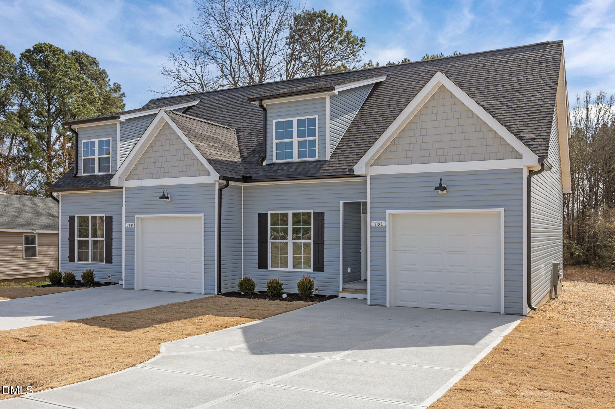 749 West Church Street Angier, NC 27501 - Photo 3 of 37 a view of a house with a patio