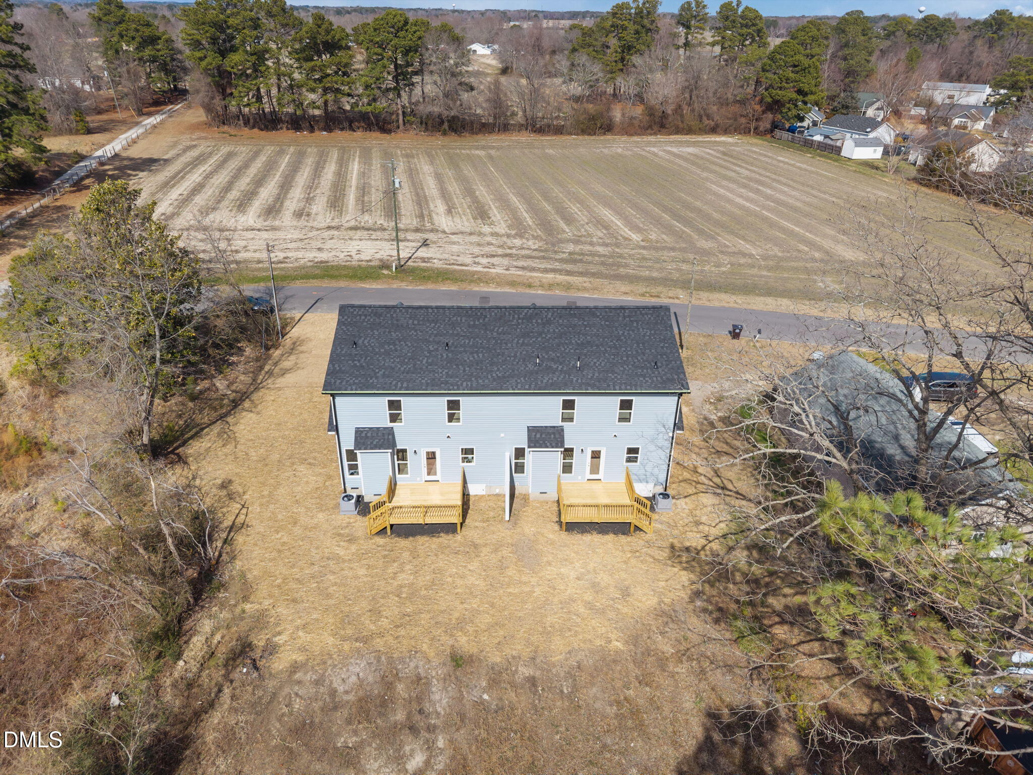 749 West Church Street Angier, NC 27501 - Photo 31 of 37 an aerial view of a house with a yard and sitting area