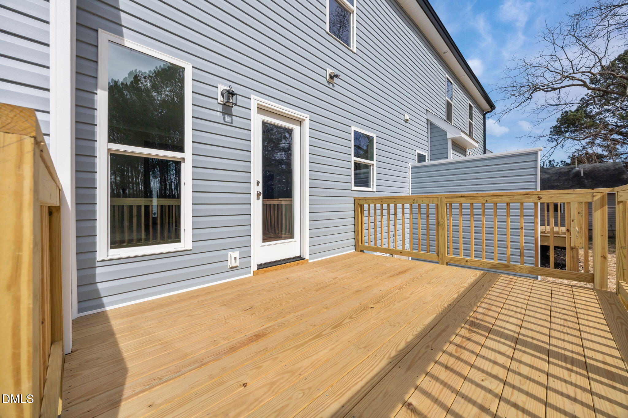 749 West Church Street Angier, NC 27501 - Photo 35 of 37 a front view of a house with a wooden floor