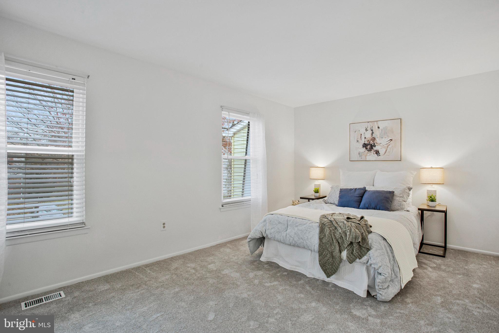 1805 Graybird Court Severn, MD 21144 - Photo 13 of 35 a bedroom with a bed and a window