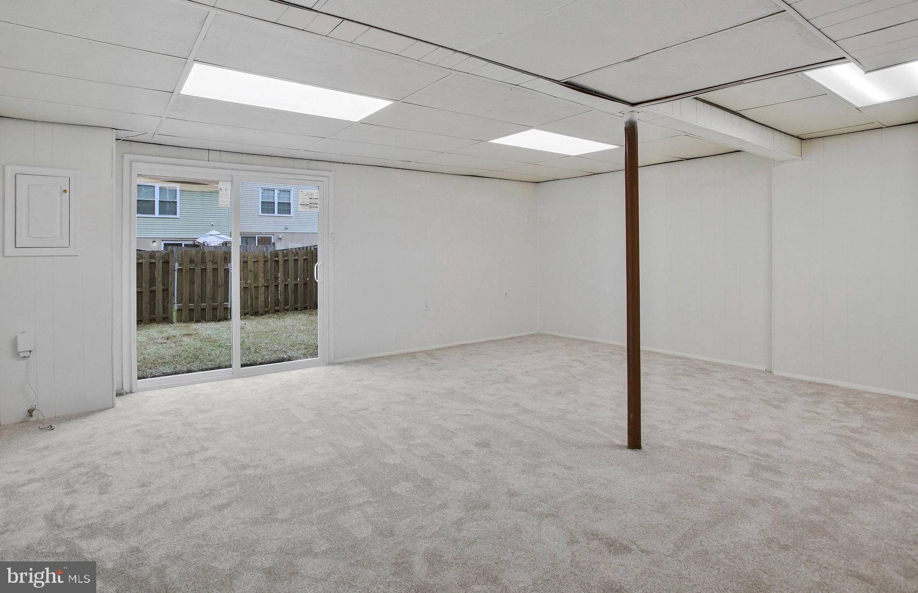 1805 Graybird Court Severn, MD 21144 - Photo 22 of 35 a view of an empty room with glass door
