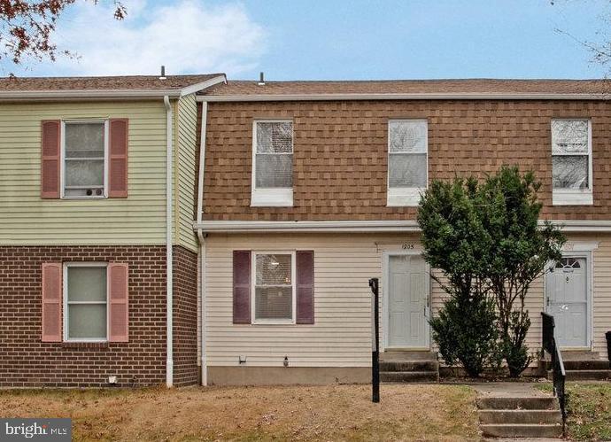 1805 Graybird Court Severn, MD 21144 - Photo 26 of 35 a front view of a house with a tree
