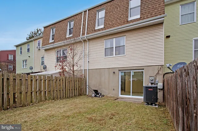 front view of a house with a trees