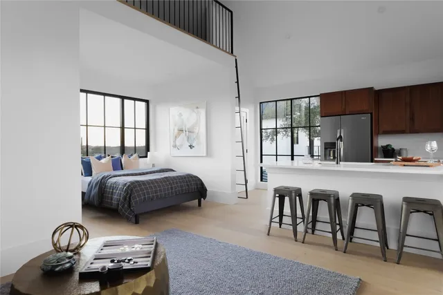 a view of a field with an ocean