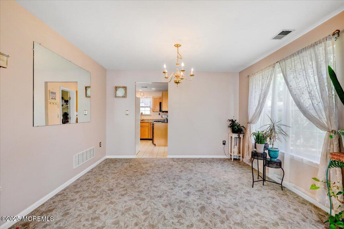 664 Adelphia Road Freehold, NJ 07728 - Photo 11 of 35 a view of livingroom with furniture and window