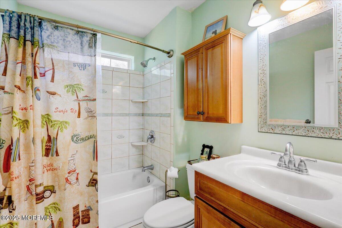 664 Adelphia Road Freehold, NJ 07728 - Photo 21 of 35 a bathroom with a sink toilet and shower