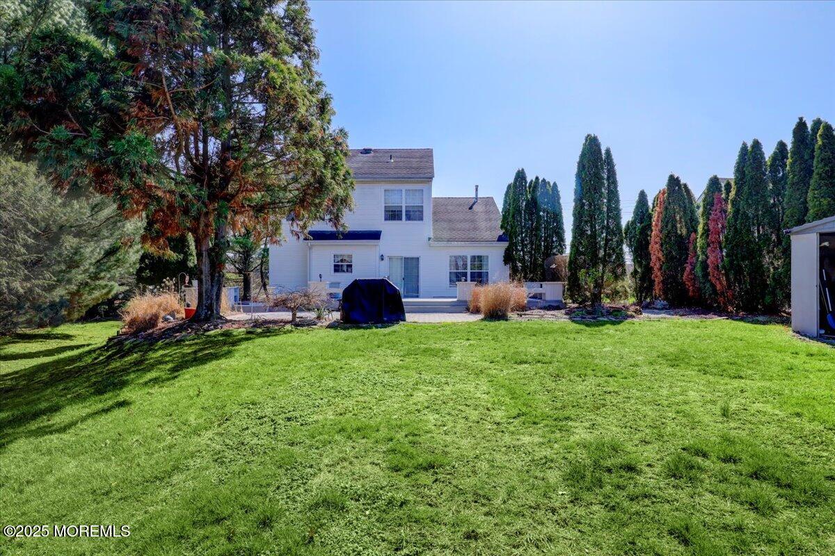 664 Adelphia Road Freehold, NJ 07728 - Photo 27 of 35 a view of outdoor space with garden and entertaining space