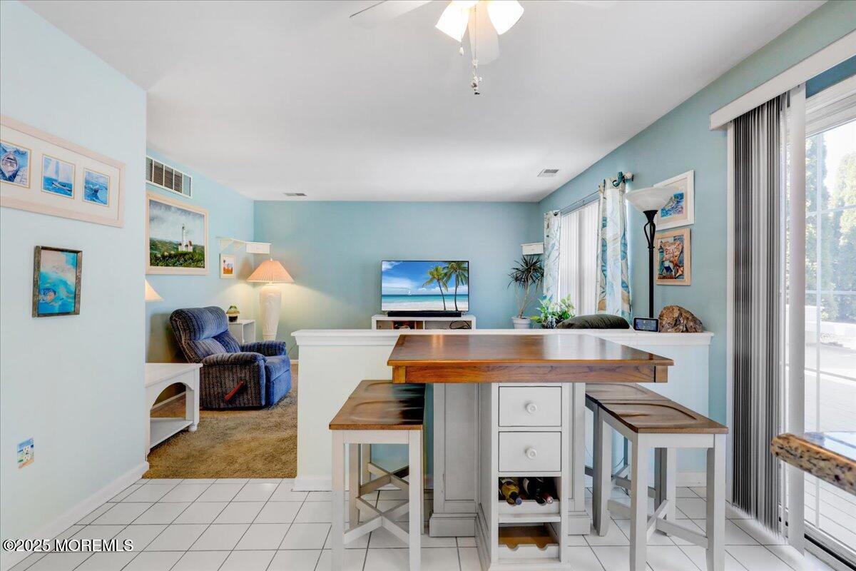 664 Adelphia Road Freehold, NJ 07728 - Photo 6 of 35 a view of a dining room with furniture