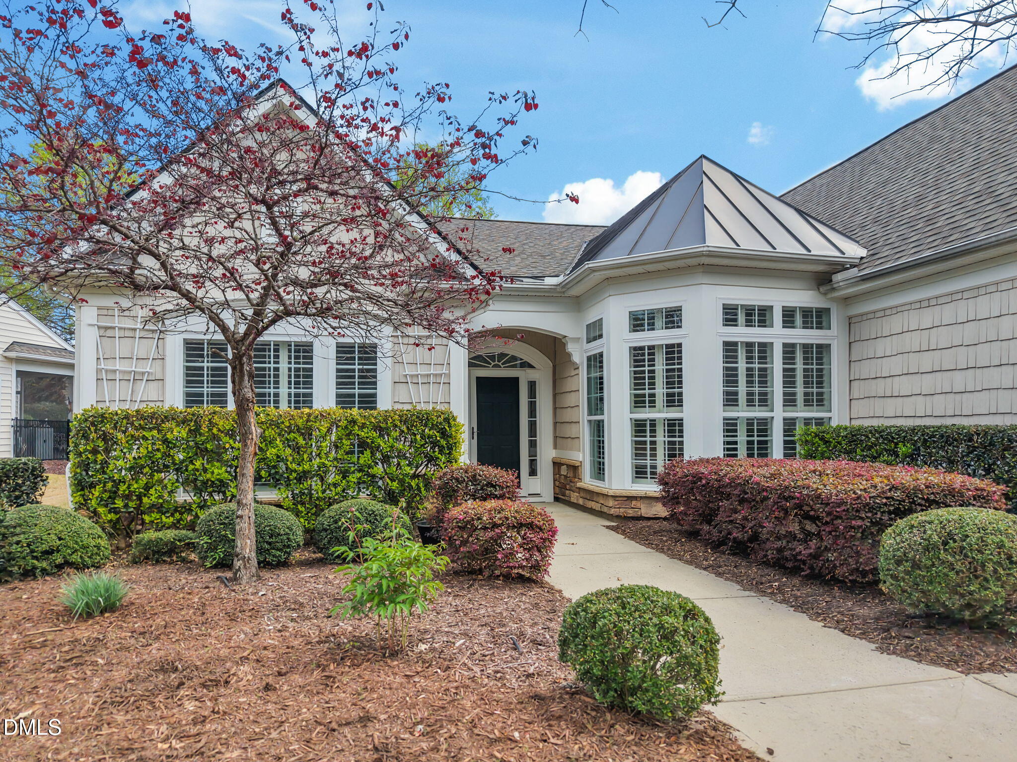 268 Beckingham Loop Cary, NC 27519 - Photo 1 of 36 a front view of a house with garden