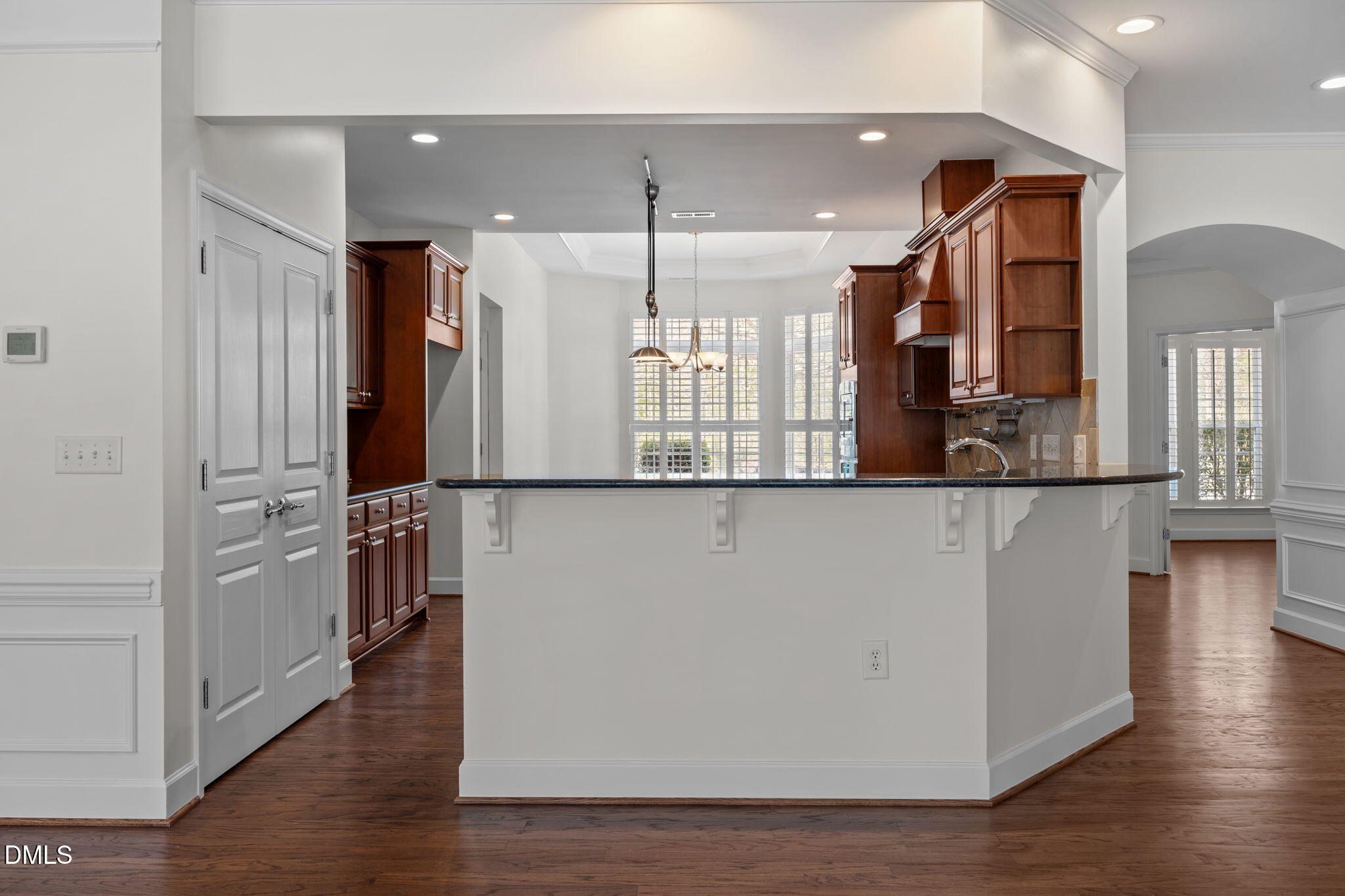 268 Beckingham Loop Cary, NC 27519 - Photo 13 of 36 a view of a living room and kitchen with a large window