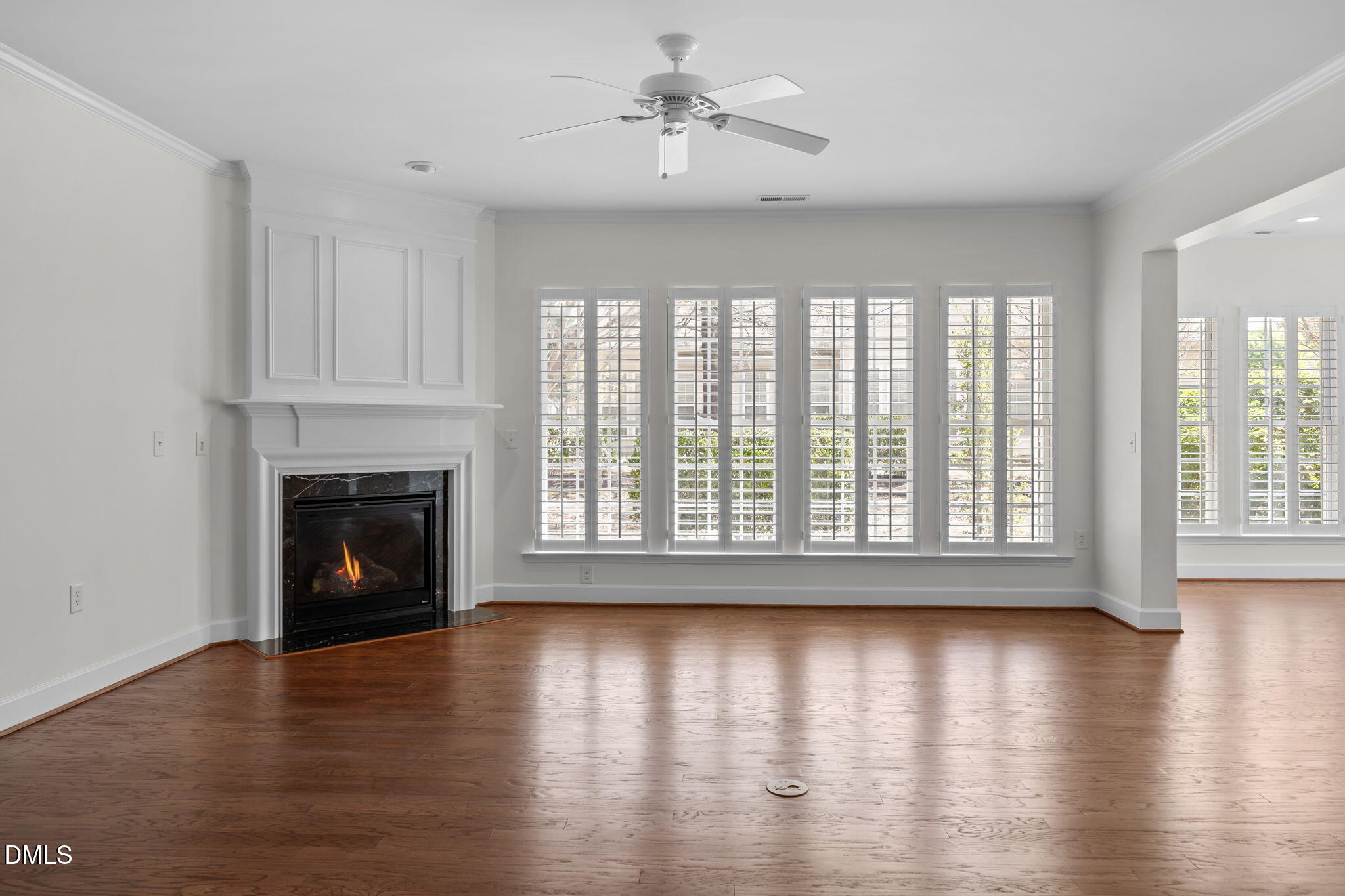 268 Beckingham Loop Cary, NC 27519 - Photo 17 of 36 a view of wooden floor fire place and windows in a room