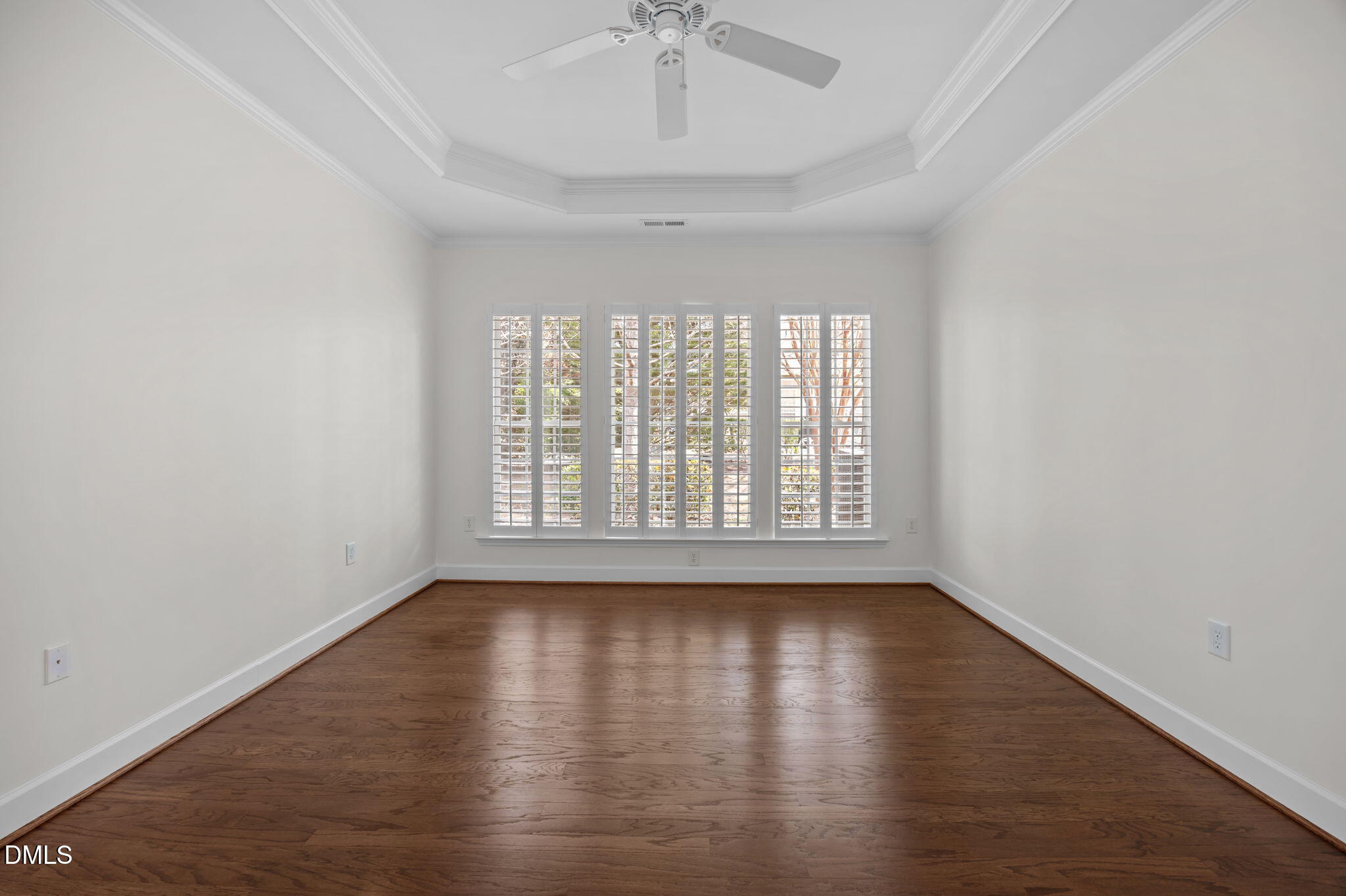 268 Beckingham Loop Cary, NC 27519 - Photo 21 of 36 wooden floor in an empty room with a window