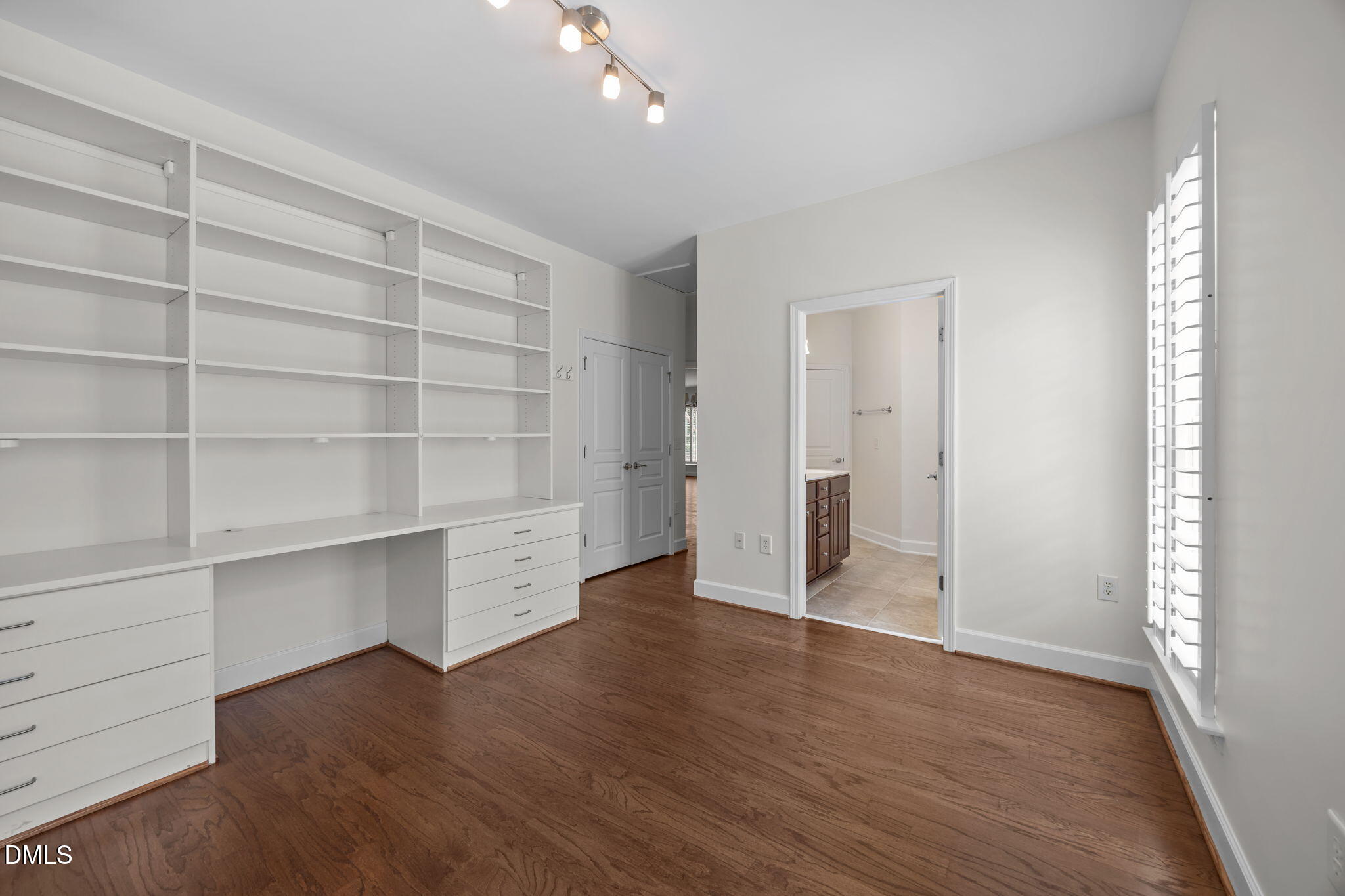 268 Beckingham Loop Cary, NC 27519 - Photo 27 of 36 a view of an empty room with a window and wooden floor